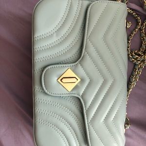 ltl London handbag. New never used the metal hardware has a few light scratches.